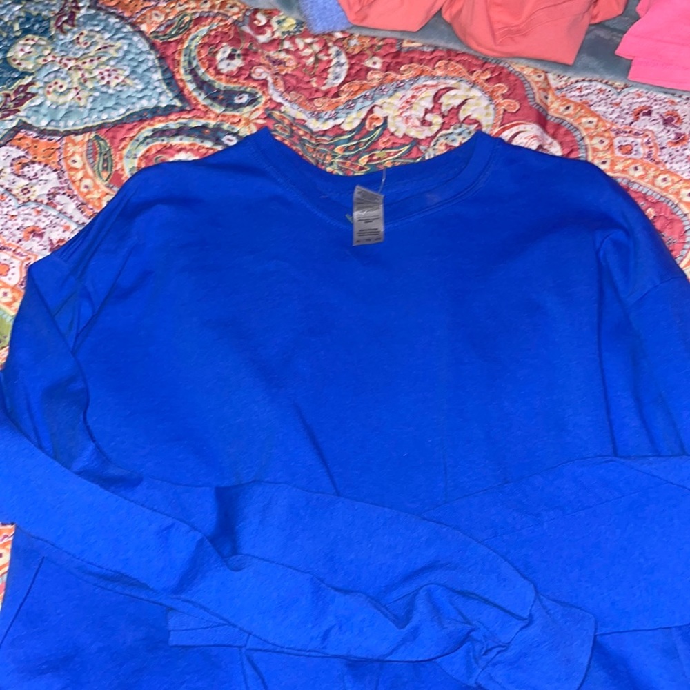 An XL blue long sleeve shirt